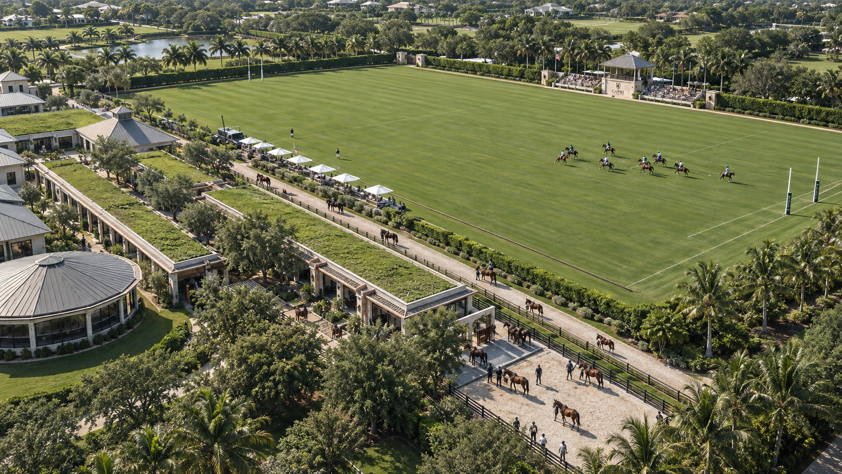 Concept rendering &mdash; aerial view of the CAPRI campus: polo field, stables and arenas